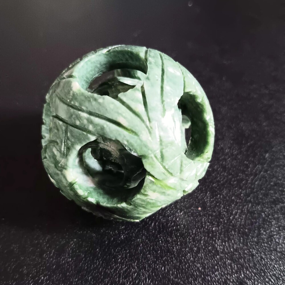 Jade Fidget Sphere with Carved Leaf Pattern